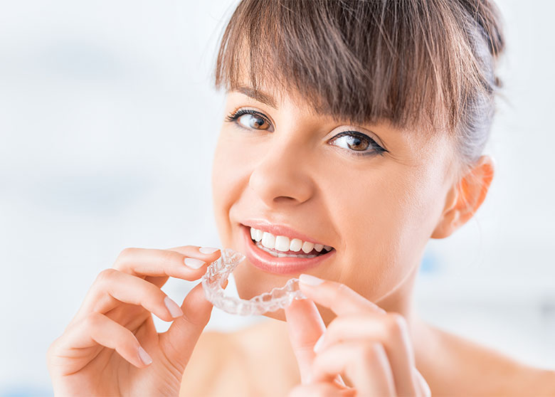 woman invisalign Prestige Family Dentistry In Flower Mound, TX